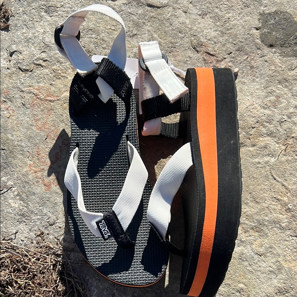 Teva Black and White Sandals with Orange Sole